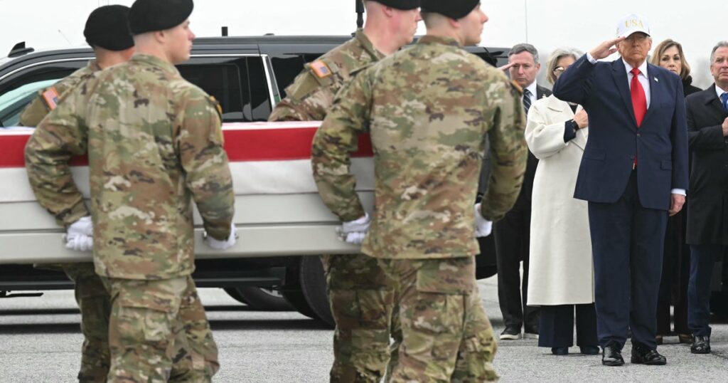 Trump salutes as 6 soldiers killed in Iran are transferred back to the U.S.