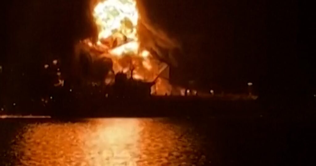 Two fuel tankers caught fire after strikes in Iraqi waters